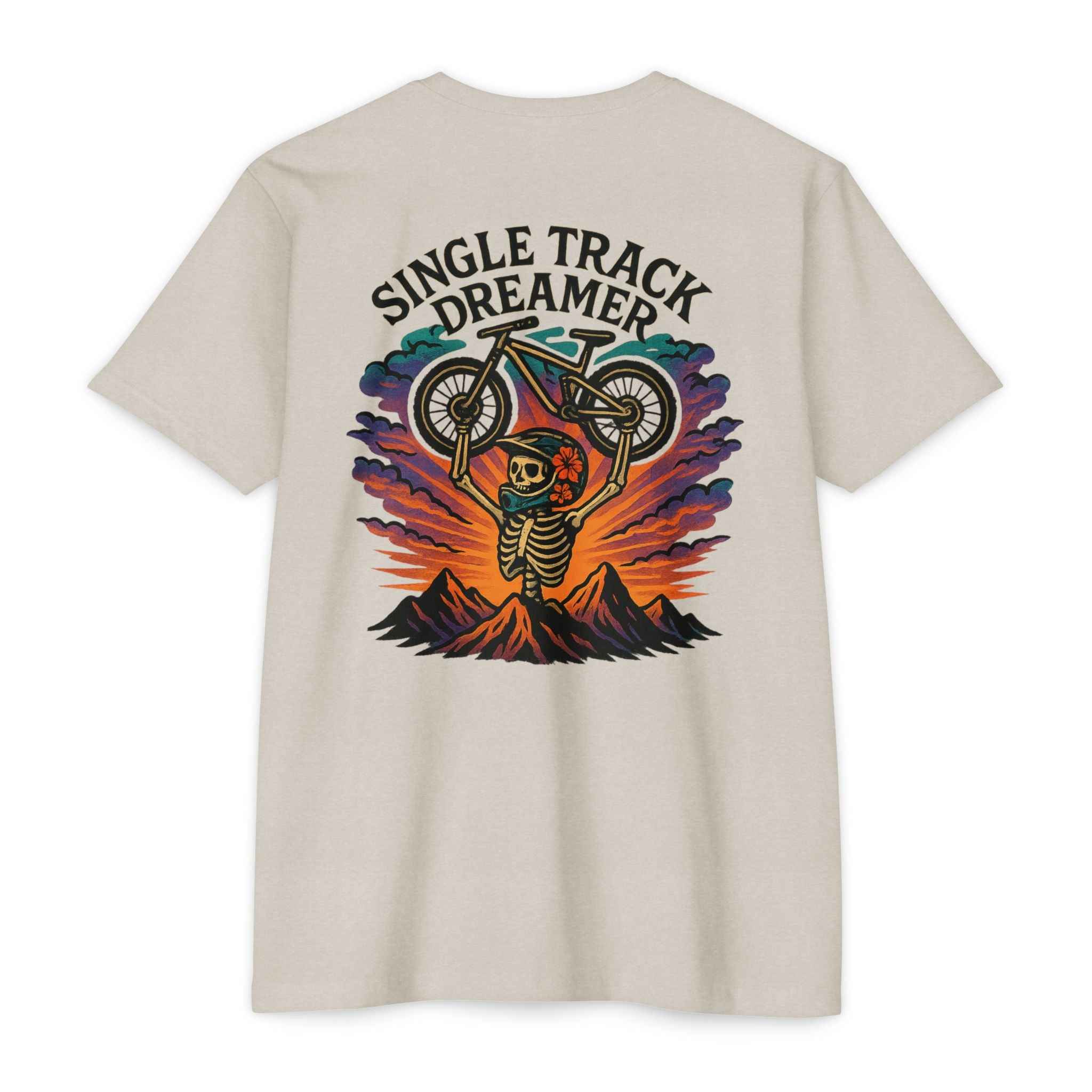 Beige t-shirt with 'Single Track Dreamer' graphic design on a white background
