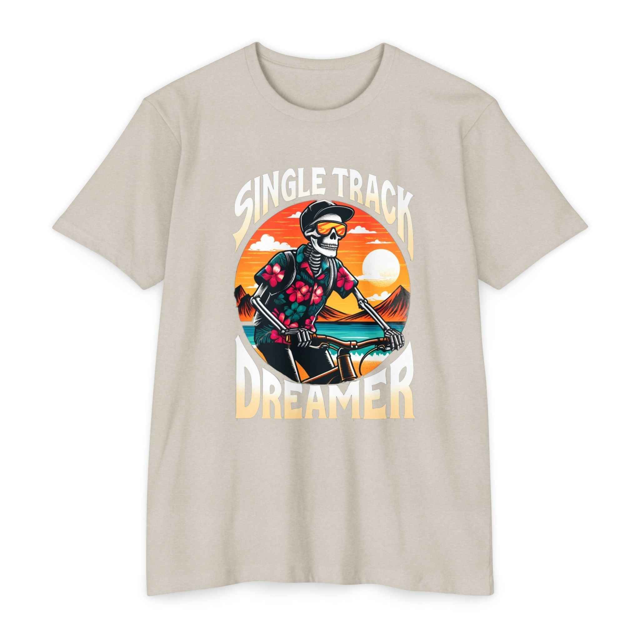 Beige men's cotton graphic t-shirt featuring a colorful skeleton biker and 'Single Track Dreamer' text, ideal for casual and outdoor style.