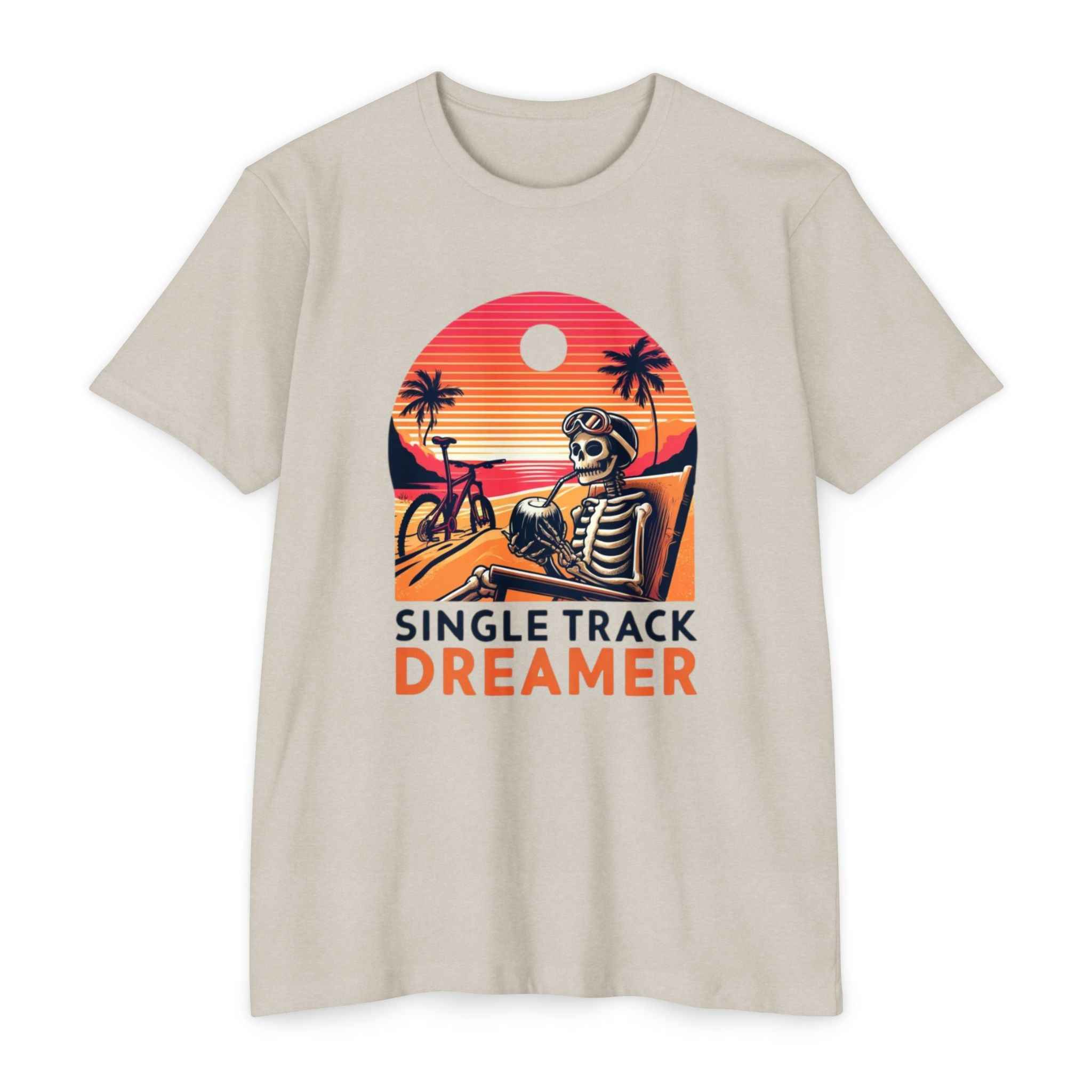 Men's Sunset Rider Bicycle T-Shirt in beige featuring a skeleton biker relaxing at sunset with palm trees and 'Single Track Dreamer' text.