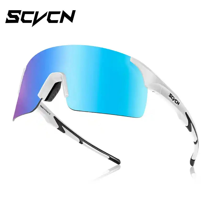 White-frame MTB cycling sunglasses with blue photochromic lens. Offers UV protection and adjustable fit for outdoor sports.