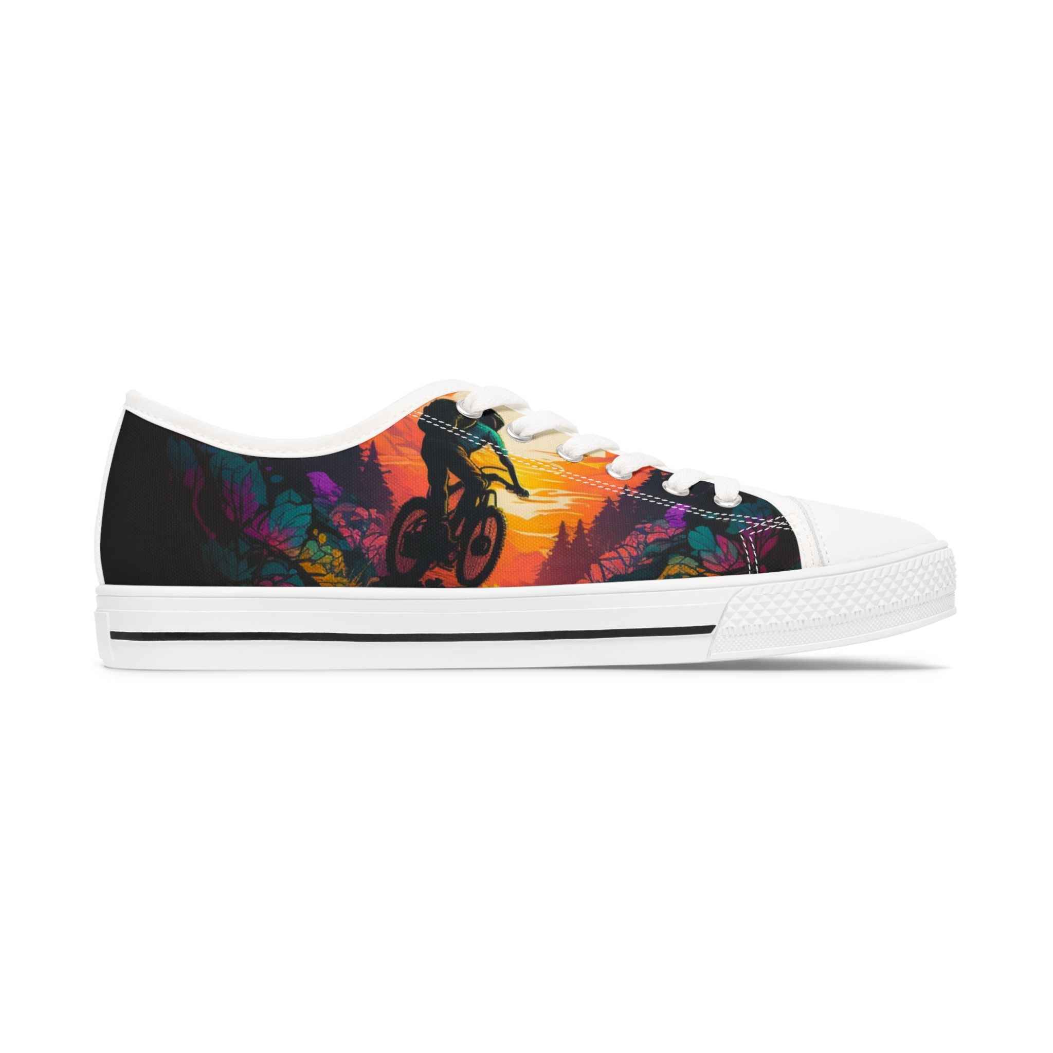 Left profile of MTB Sunset Sneakers with vivid biking scene and breathable canvas, designed for stylish women’s outdoor footwear.
