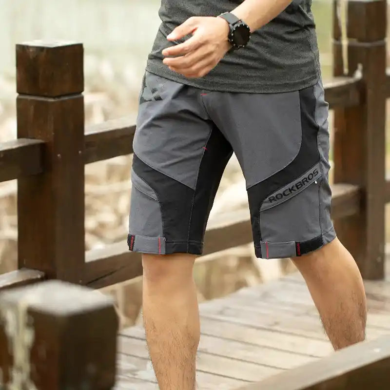 ROCKBROS gray and black cycling bike shorts designed for summer sports, offering breathable fabric and ergonomic fit for MTB riders.