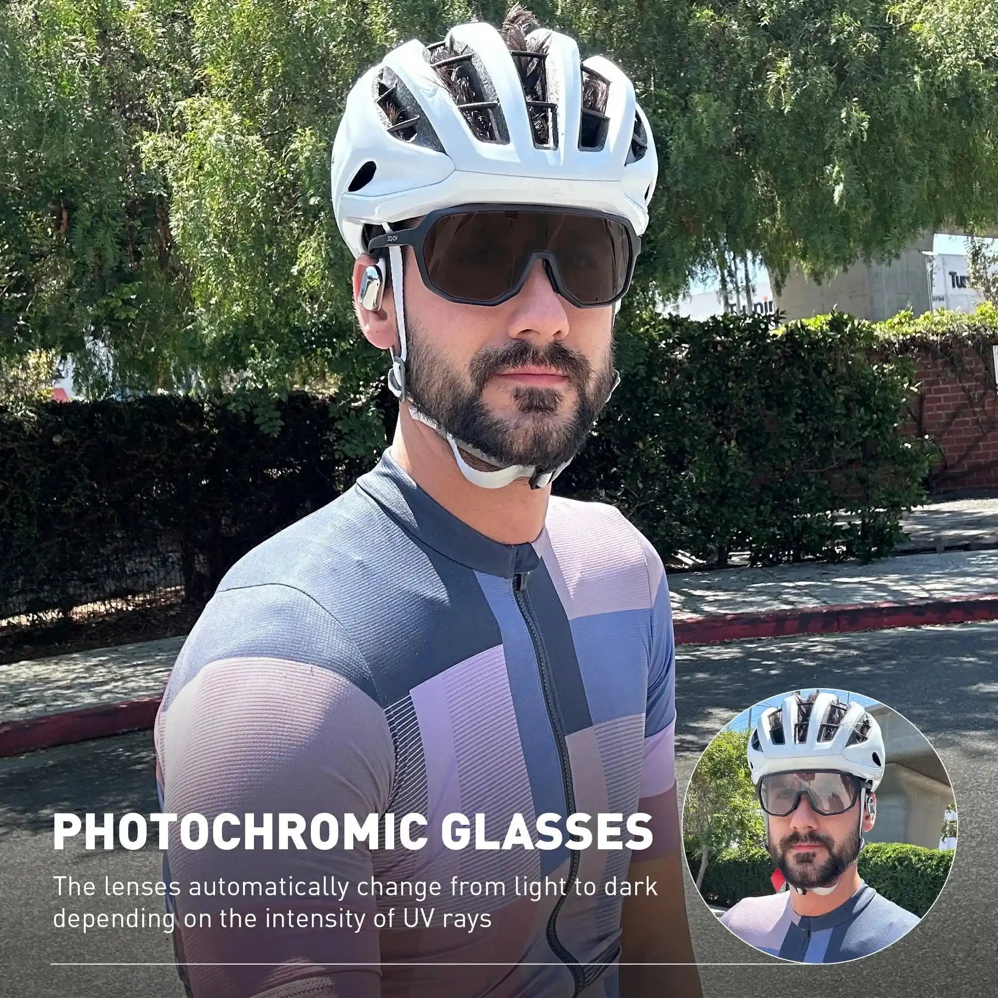 Man wearing photochromic cycling glasses with UV400 protection, ideal for day and night use during outdoor cycling activities.