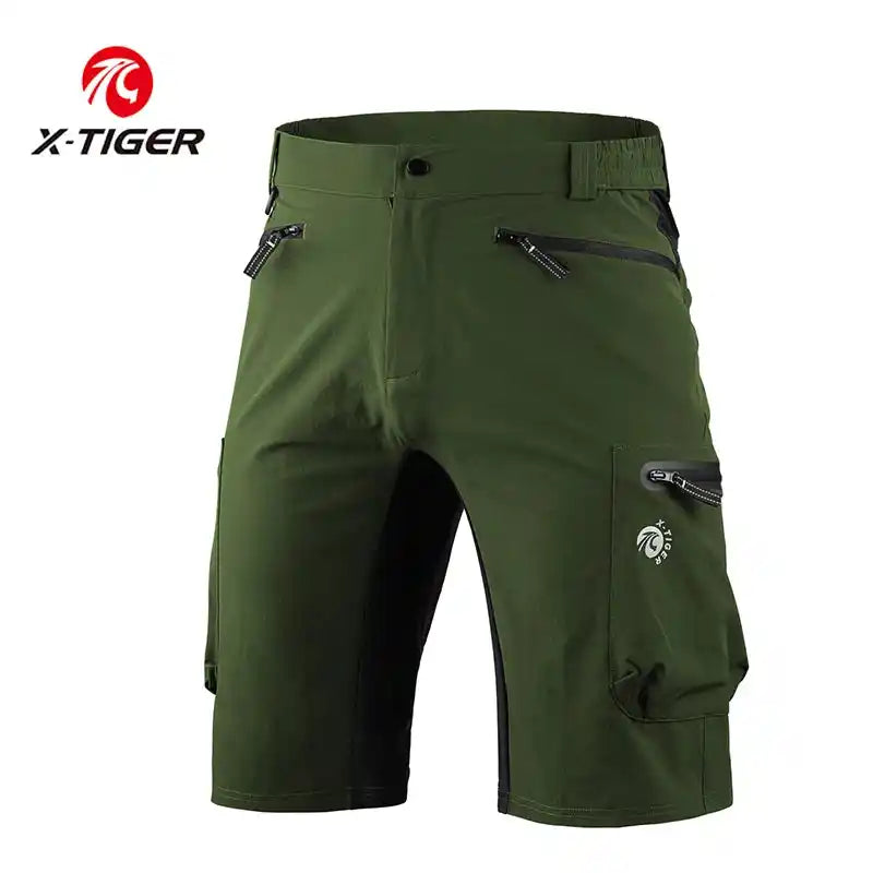 Green X-TIGER mountain cycling shorts waterproof with multi-zipper pockets and breathable design for MTB and outdoor adventures.