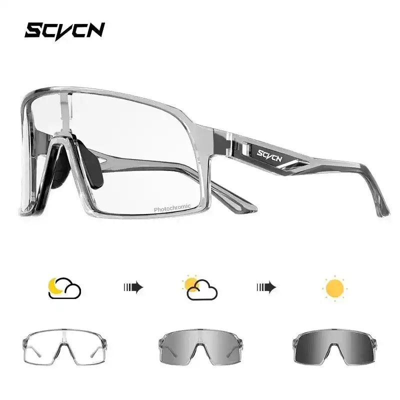 Clear frame UV400 cycling glasses with grey photochromic lenses, built for high impact resistance and adaptive light protection during sports.