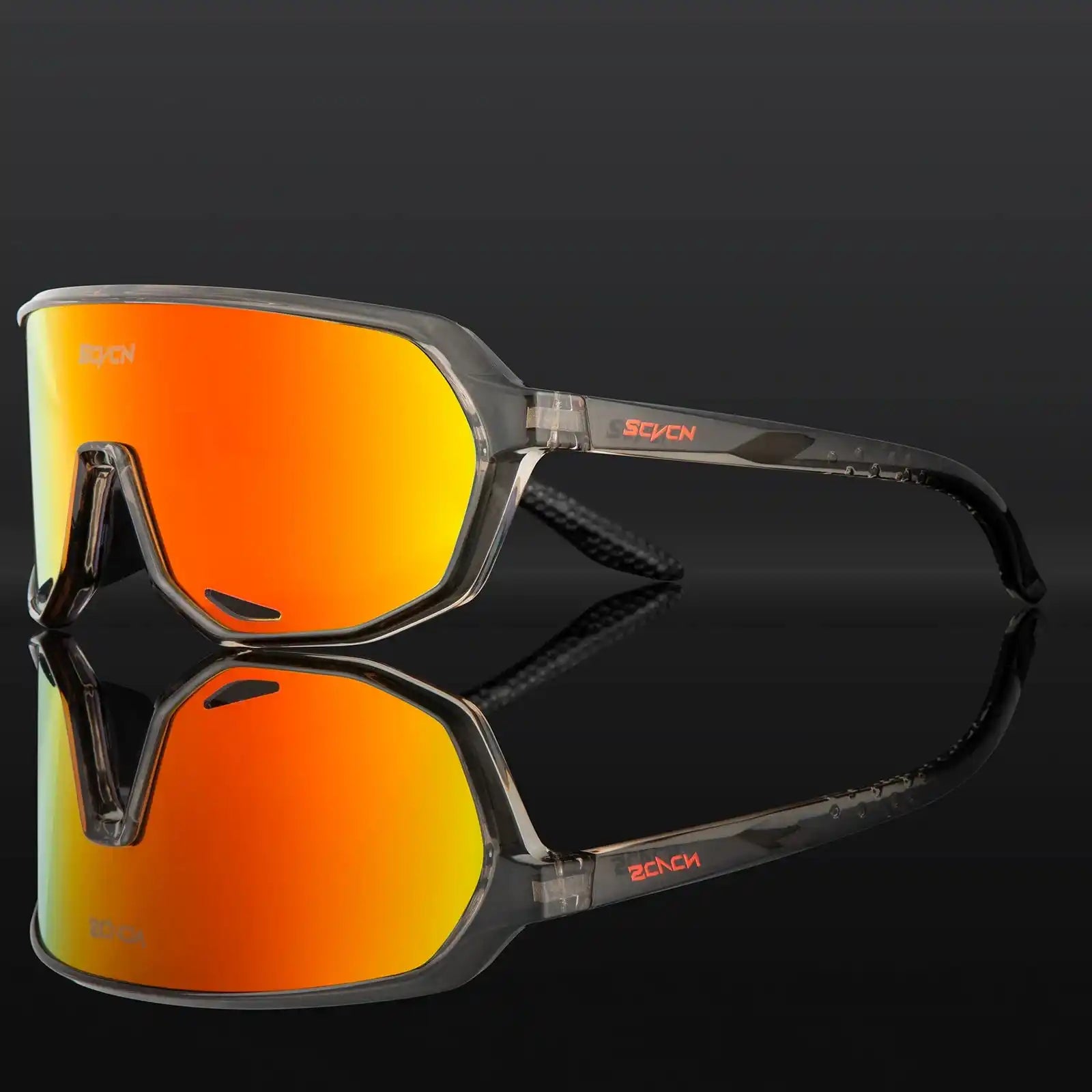 Dark transparent frame sports sunglasses with orange-red photochromic lenses, ideal for UV protection during cycling and outdoor use.