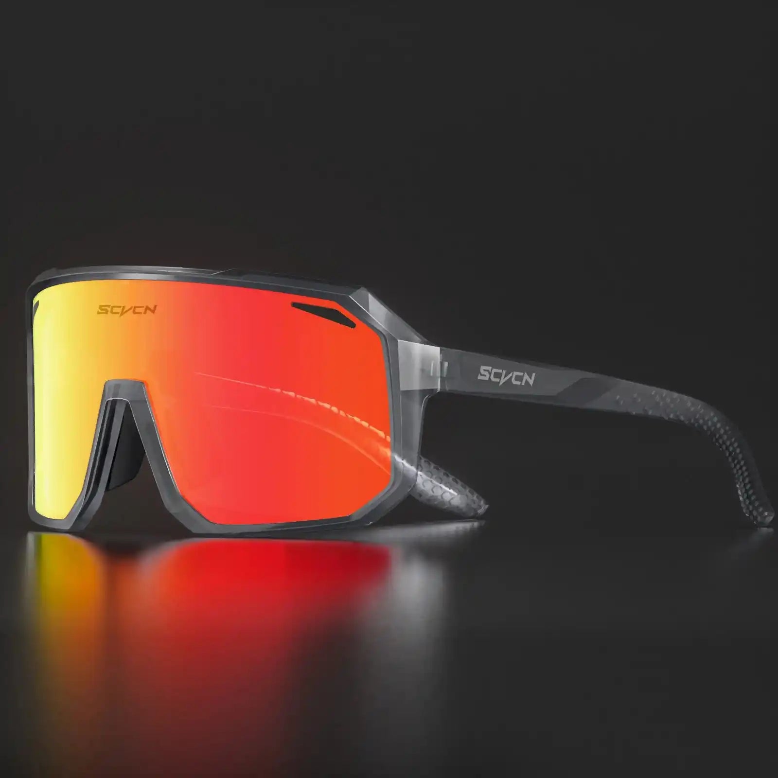 Durable SCVCN HOT MTB cycling glasses with UV400 protection, featuring a transparent black frame and red mirrored lenses.