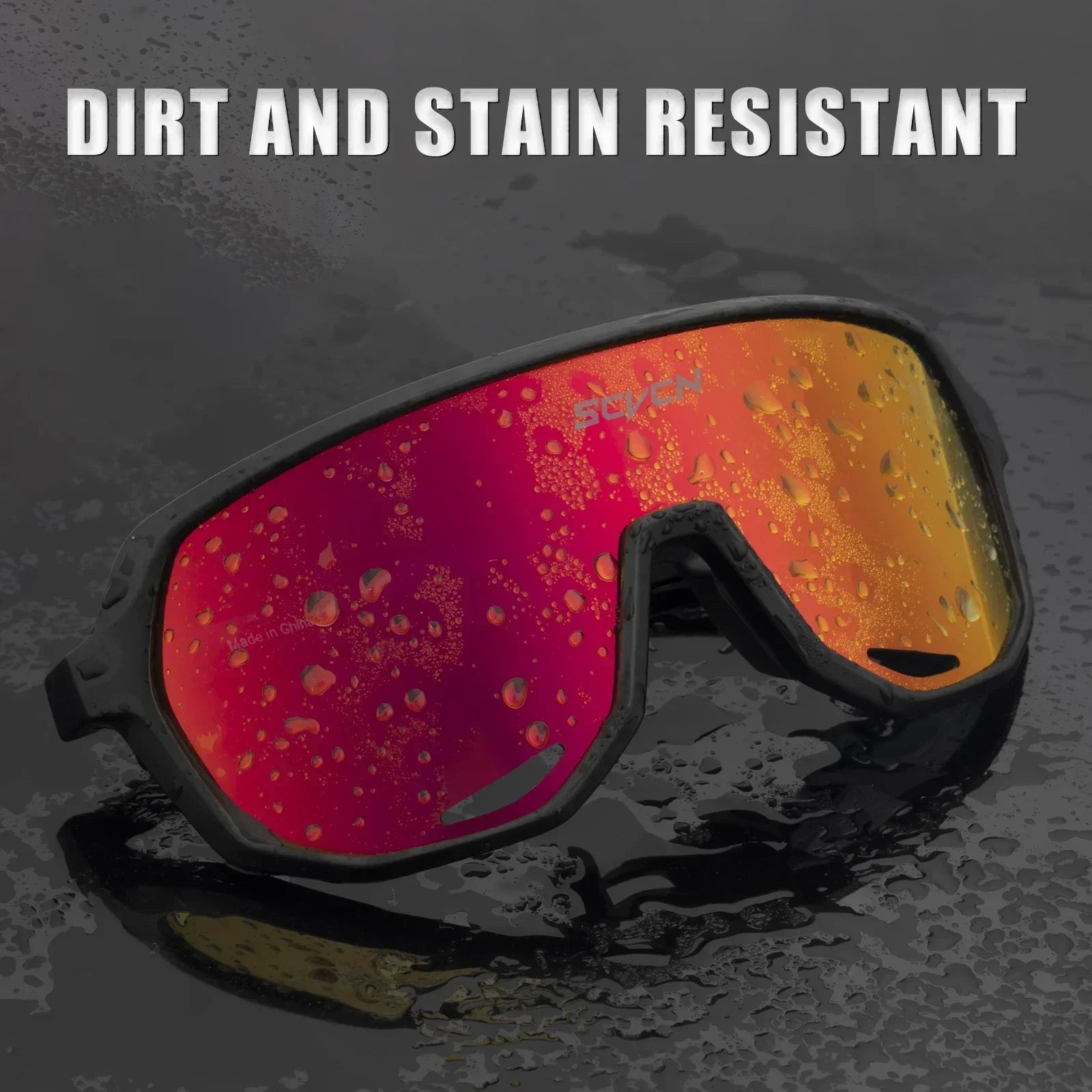 SCVCN MTB cycling glasses with red mirrored lens shown with water droplets, highlighting dirt and stain resistant features for rugged outdoor use.