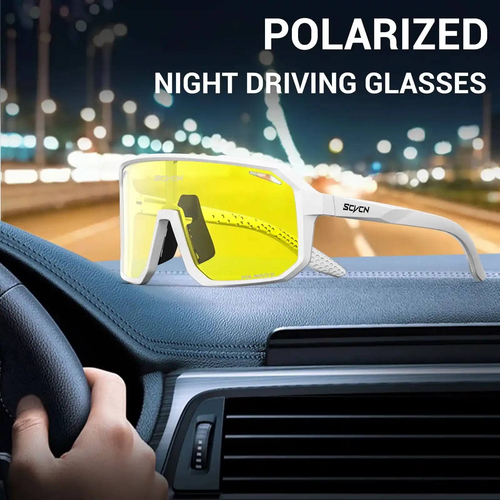 SCVCN white frame cycling glasses with yellow polarized lenses placed on car dashboard, ideal for night driving and outdoor sports.