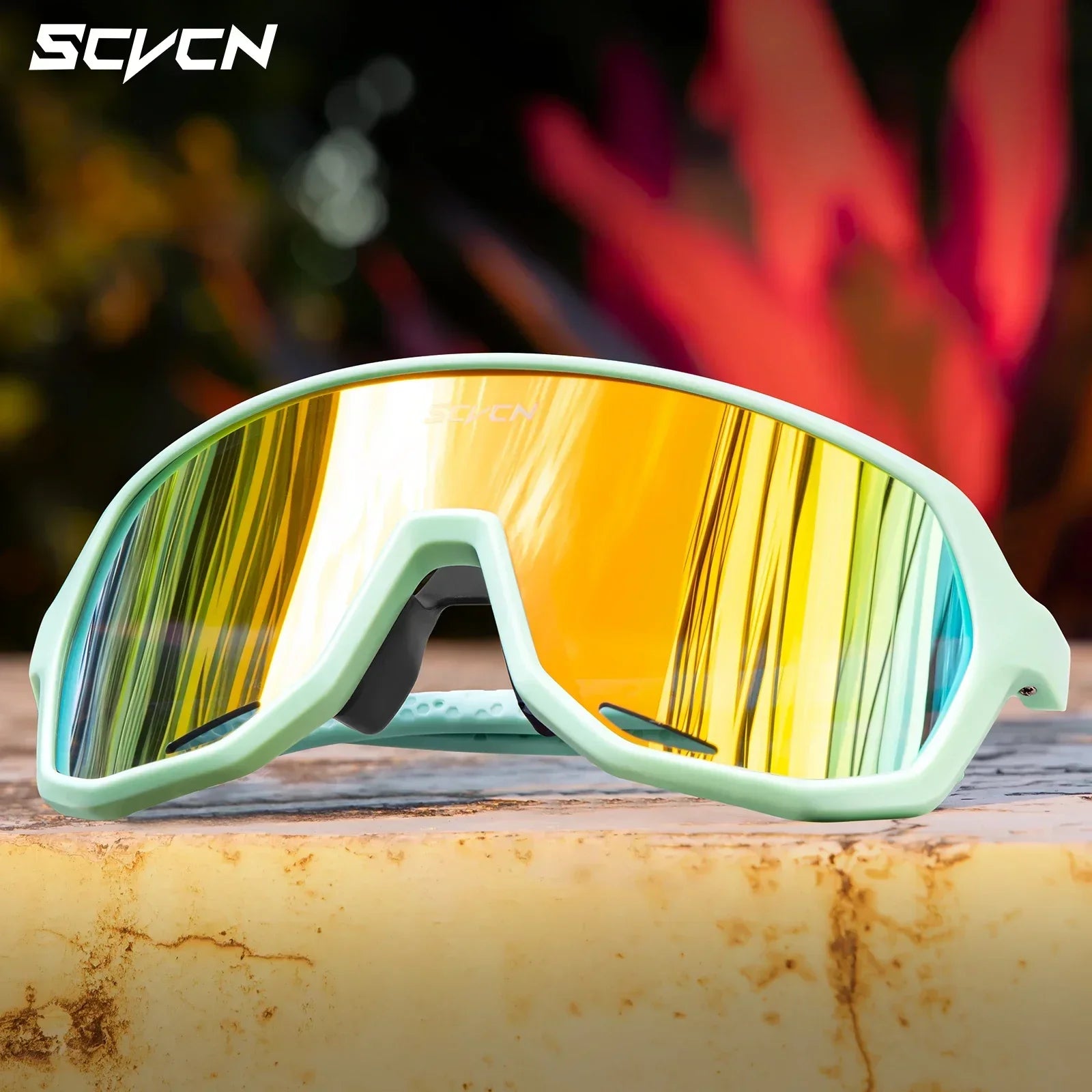 SCVCN cycling glasses with mint green frame and yellow mirrored lens, offering windproof and glare-reducing protection for outdoor sports.